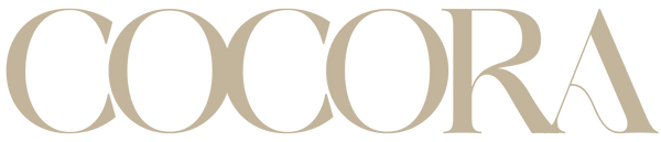 COCORA logo in beige on a white background